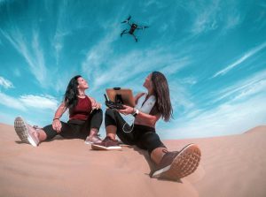 Women flying a drone