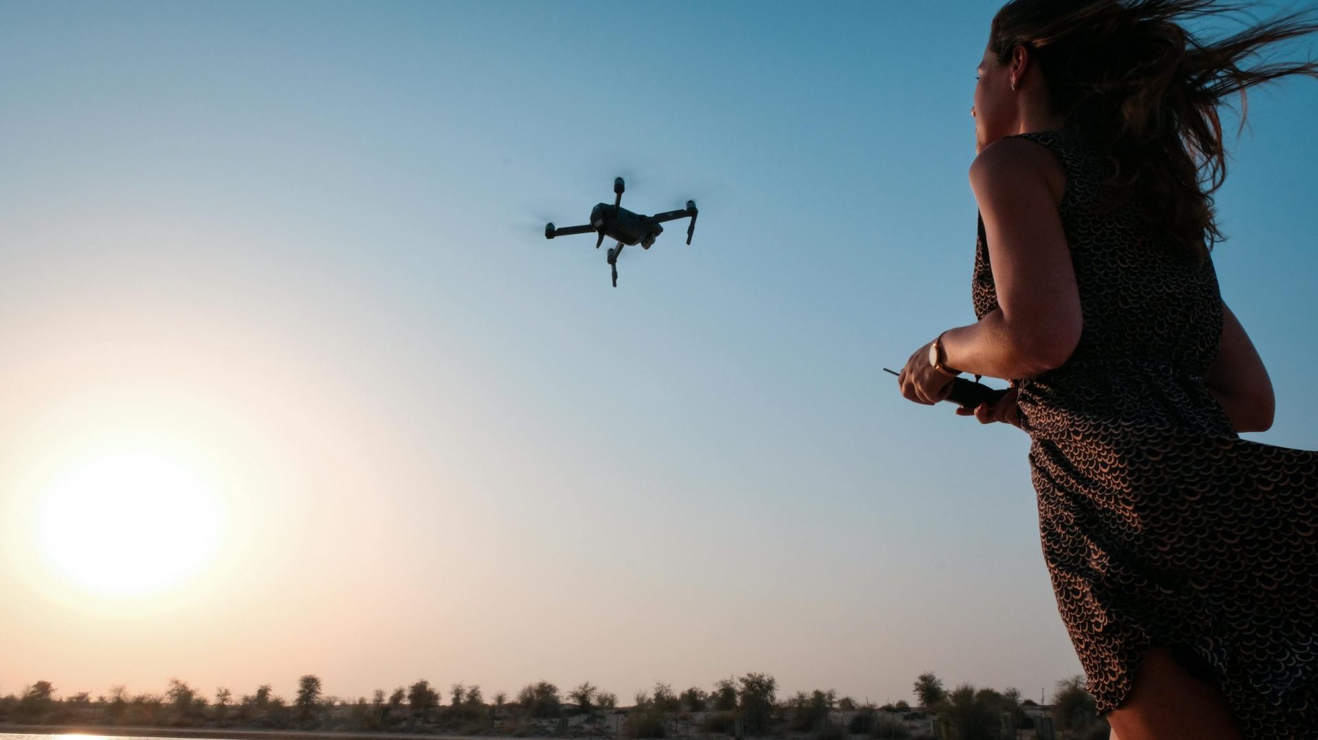 woman flying a drone